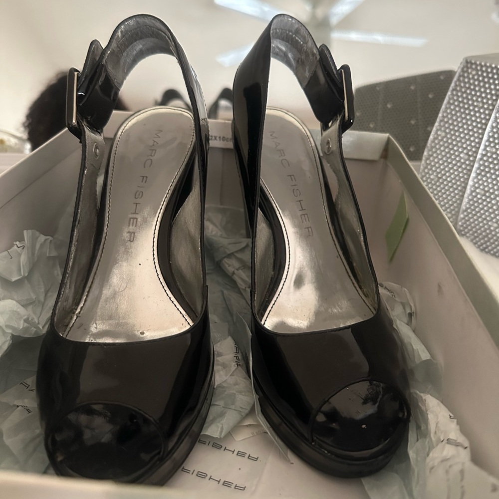 Marc Fisher Black Peep-Toe Heels
Priced to reflect scuffs on the heels/shoes.